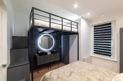Un ou plusieurs lits dans un hébergement de l'établissement Charmant appartement paris center design Montmartre
