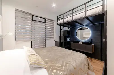 Un ou plusieurs lits dans un hébergement de l'établissement Charmant appartement paris center design Montmartre