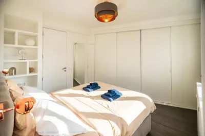 Un ou plusieurs lits dans un hébergement de l'établissement Appartement cosy&design climatisation Montparnasse