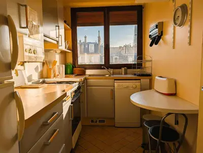 Cuisine ou kitchenette dans l'établissement Vintage Pied-a-Terre - Eiffel Tower View