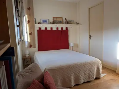 Un ou plusieurs lits dans un hébergement de l'établissement Vintage Pied-a-Terre - Eiffel Tower View