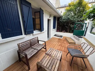 Balcon ou terrasse dans l'établissement Charmante maison limitrophe Paris