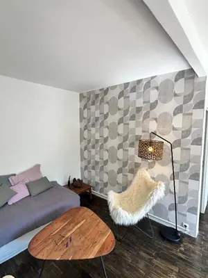 Coin salon dans l'établissement Charmante maison limitrophe Paris