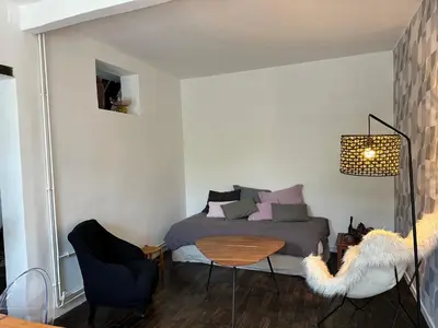 Coin salon dans l'établissement Charmante maison limitrophe Paris