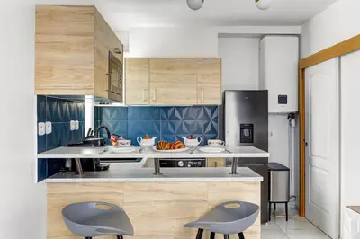 Cuisine ou kitchenette dans l'établissement Suite Petit - Havre de paix au cœur de Paris