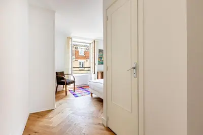 Un ou plusieurs lits dans un hébergement de l'établissement Parisian apartment in the 5th