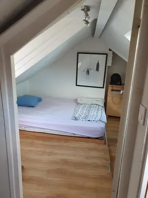 Un ou plusieurs lits dans un hébergement de l'établissement Appartement en duplex avec 3 chambres, au 4e et dernier étage