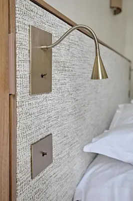 Un ou plusieurs lits dans un hébergement de l'établissement Heart Marais Luxury 2BR AC by Melvane