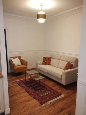 Coin salon dans l'établissement Charming apartment Paris