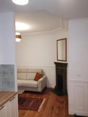 Coin salon dans l'établissement Charming apartment Paris