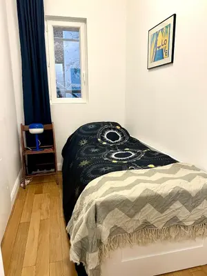 Un ou plusieurs lits dans un hébergement de l'établissement Exceptional apartment in the heart of Paris