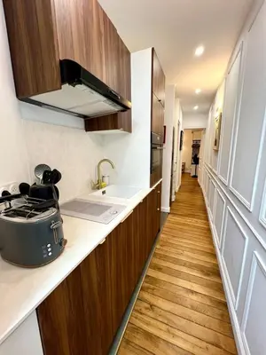Cuisine ou kitchenette dans l'établissement Exceptional apartment in the heart of Paris