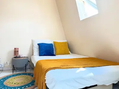 Un ou plusieurs lits dans un hébergement de l'établissement Charming Studio in Central Paris Near the Seine N1-242