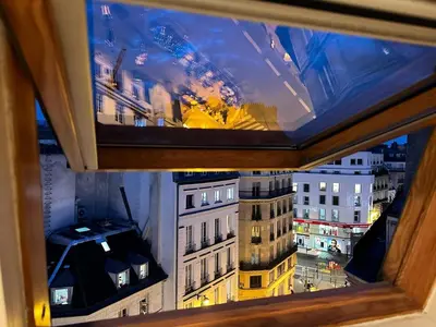 Vue générale sur Paris ou vue de la ville depuis l'appartement