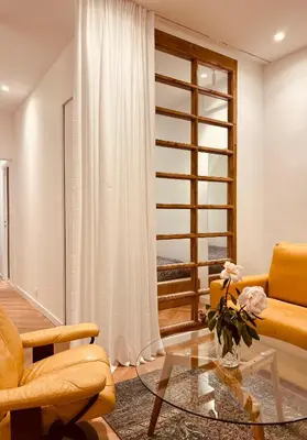Coin salon dans l'établissement Cozy Paris Flat near Saint-Germain & Luxembourg Gardens