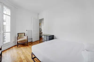 Un ou plusieurs lits dans un hébergement de l'établissement Elegant Apartment 1BR 4P – Paris 15 Montparnasse