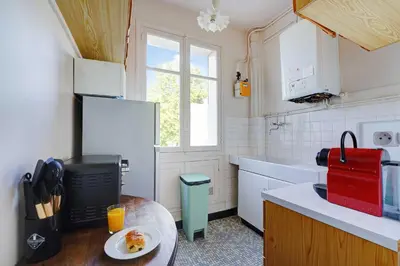 Cuisine ou kitchenette dans l'établissement Elegant Apartment 1BR 4P – Paris 15 Montparnasse