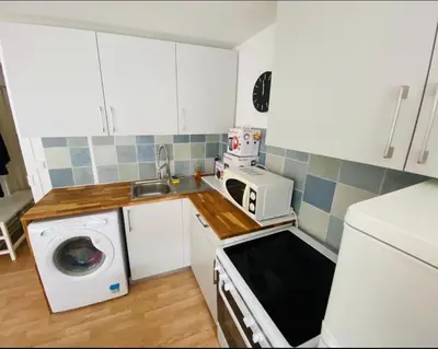 Cuisine ou kitchenette dans l'établissement NEW appartement au cœur de Paris