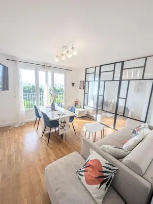 Coin salon dans l'établissement Apartment with Seine view - 9 people