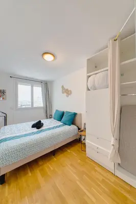 Un ou plusieurs lits dans un hébergement de l'établissement Apartment with Seine view - 9 people