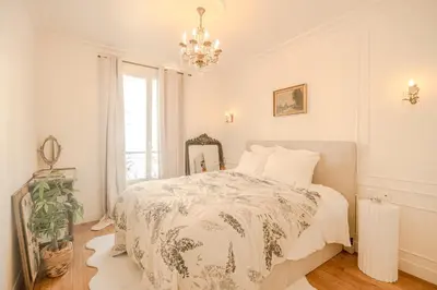 Un ou plusieurs lits dans un hébergement de l'établissement Appartement de la Seine