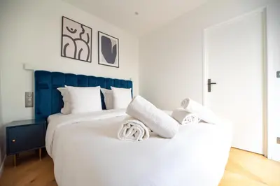 Un ou plusieurs lits dans un hébergement de l'établissement Sweet Home near Place Vendôme