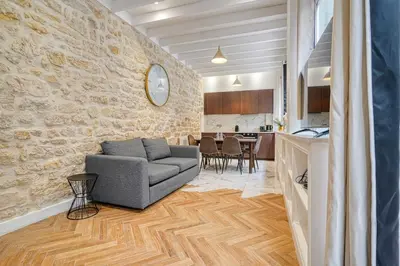 Coin salon dans l'établissement Design Loft for 6 guests in Sentier