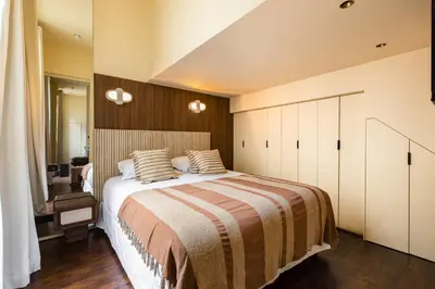 Un ou plusieurs lits dans un hébergement de l'établissement NoChichi-Collections - Residence Saint-Honore