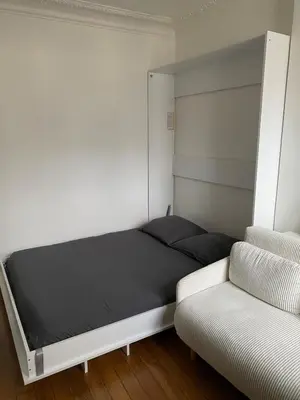 Un ou plusieurs lits dans un hébergement de l'établissement Equipped studio - Paris, 15th
