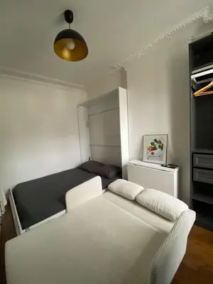 Un ou plusieurs lits dans un hébergement de l'établissement Equipped studio - Paris, 15th