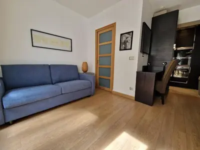 Coin salon dans l'établissement A deux pas de l'Arc de Triomphe Studio tout équipé