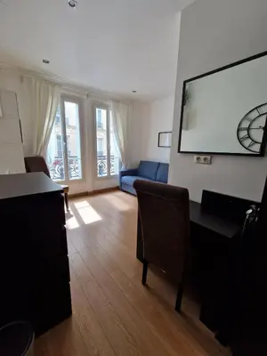 Télévision ou salle de divertissement dans l'établissement A deux pas de l'Arc de Triomphe Studio tout équipé