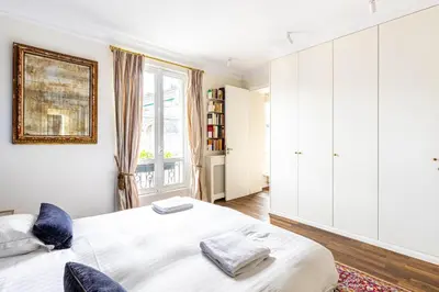 Un ou plusieurs lits dans un hébergement de l'établissement GuestReady - Parisian stay near the Eiffel Tower
