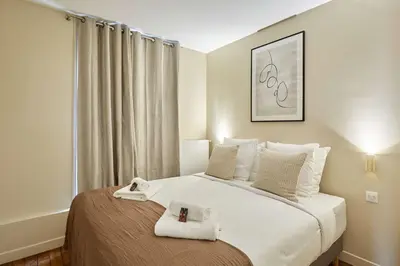 Un ou plusieurs lits dans un hébergement de l'établissement Charming 1 bedroom - Bastille Le Marais