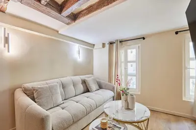 Coin salon dans l'établissement Amazing apartment in Center of Paris