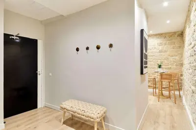 Coin salon dans l'établissement Charming Apartment Center of Paris by Studio Prestige