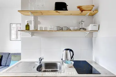 Cuisine ou kitchenette dans l'établissement BM-Cocon citadin quartier du faubourg Saint Denis