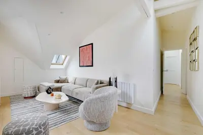 Coin salon dans l'établissement Apt a c 3BR 6P - Saint-Lazare Les Champs Elysée