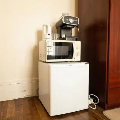 Cuisine ou kitchenette dans l'établissement A spacious room in a strategic area