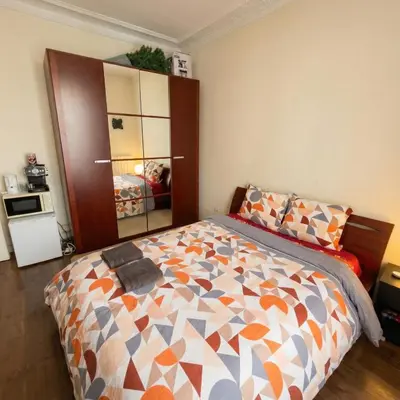 Un ou plusieurs lits dans un hébergement de l'établissement A spacious room in a strategic area