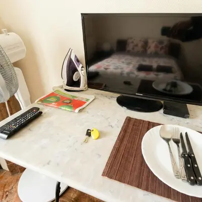 Télévision ou salle de divertissement dans l'établissement A spacious room in a strategic area