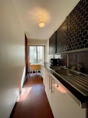 Cuisine ou kitchenette dans l'établissement Tour Eiffel Abbe Groult Lecourbe