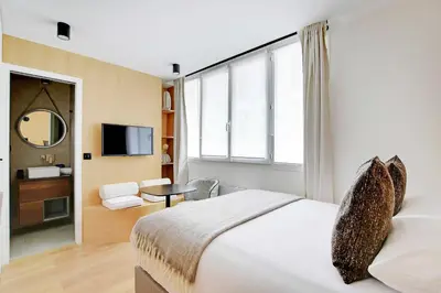 Un ou plusieurs lits dans un hébergement de l'établissement Charming Studio 2P - Place de la République