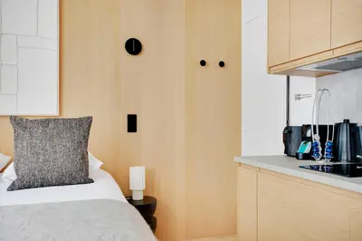 Un ou plusieurs lits dans un hébergement de l'établissement Charming Studio 2P - Place de la République