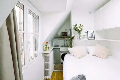 Un ou plusieurs lits dans un hébergement de l'établissement Studio - Tour Eiffel - Trocadéro