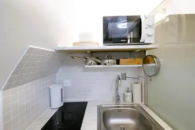 Cuisine ou kitchenette dans l'établissement Studio - Tour Eiffel - Trocadéro