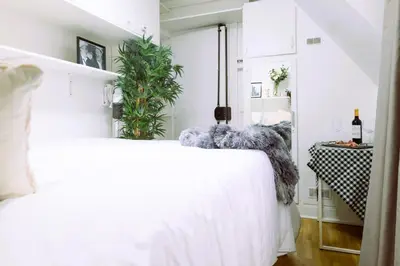 Un ou plusieurs lits dans un hébergement de l'établissement Studio - Tour Eiffel - Trocadéro