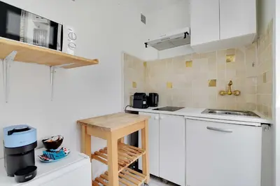 Cuisine ou kitchenette dans l'établissement Charming Studio 2P - Paris 11th Bastille