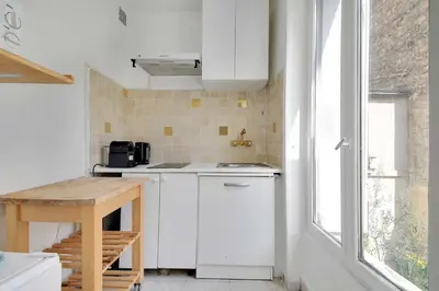 Cuisine ou kitchenette dans l'établissement Charming Studio 2P - Paris 11th Bastille