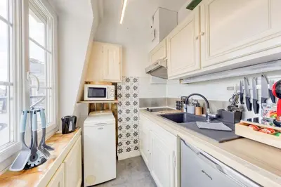 Cuisine ou kitchenette dans l'établissement T2 lumineux avec balcon - Calme, vue dégagée
